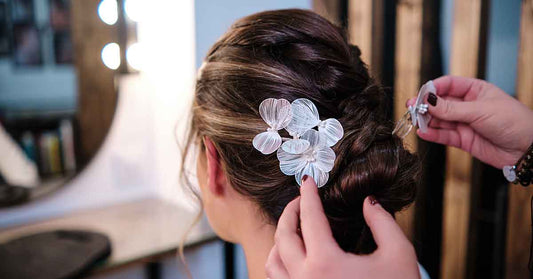 Bride getting ready with polished hair before wedding event