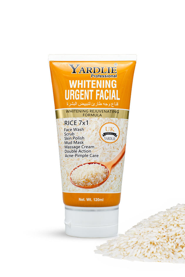 Yardlie Whitening Urgent Facial Rice 7 in 1 120ml tube, rice based whitening face wash and scrub in Pakistan.
A squeeze tube of Yardlie Professional Whitening Urgent Facial cream with a white cap, featuring orange and white packaging with a rice graphic, set against a white background with a pile of white rice grains in the lower right corner.