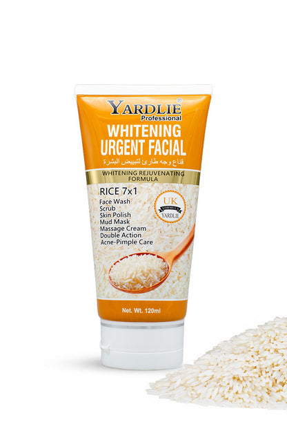 Yardlie Whitening Urgent Facial Rice 7 in 1 120ml tube, rice based whitening face wash and scrub in Pakistan.
A squeeze tube of Yardlie Professional Whitening Urgent Facial cream with a white cap, featuring orange and white packaging with a rice graphic, set against a white background with a pile of white rice grains in the lower right corner.