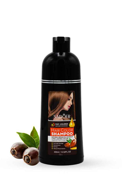 Sadeer hair color shampoo bottle with leaves on a white background