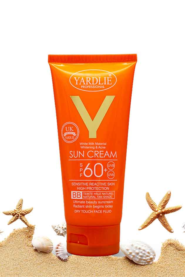 Yardlie Sun Cream SPF 60 BB Natural Tan sunscreen 100ml, Orange tube of Yardlie sun cream with sand and starfish on a white background