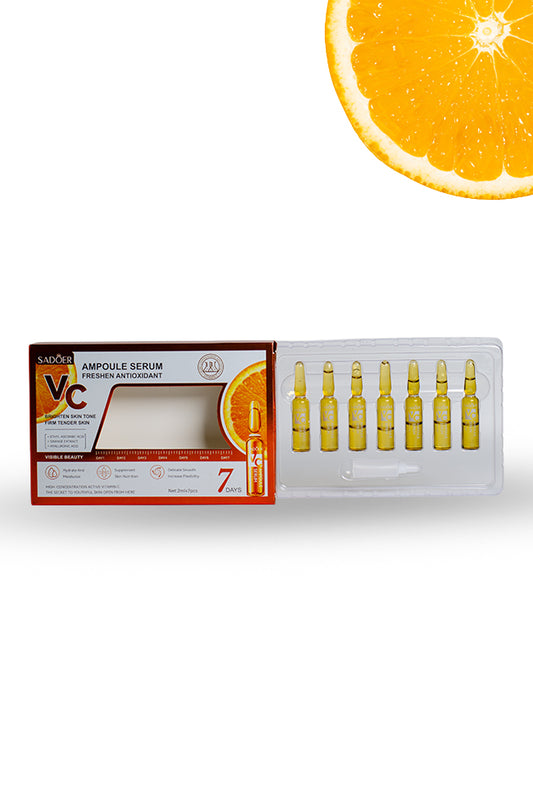 SADOER VC Vitamin C ampoule serum 7 day kit with ampoules and orange theme packaging on white background, Vitamin C serum packaging with ampoules and an orange slice on a white background
