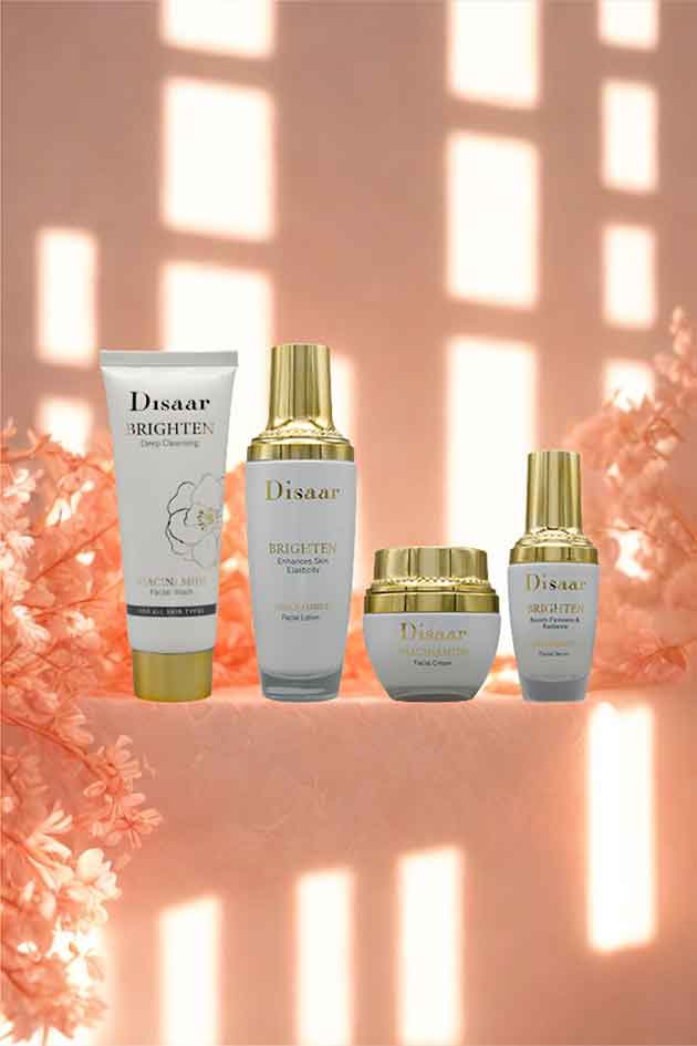 Disaar Niacinamide 4-in-1 Brighten Skincare Kit – facial wash, lotion, cream, and serum for glowing hydrated skin. Set of Disaar skincare products on a pink background with floral elements