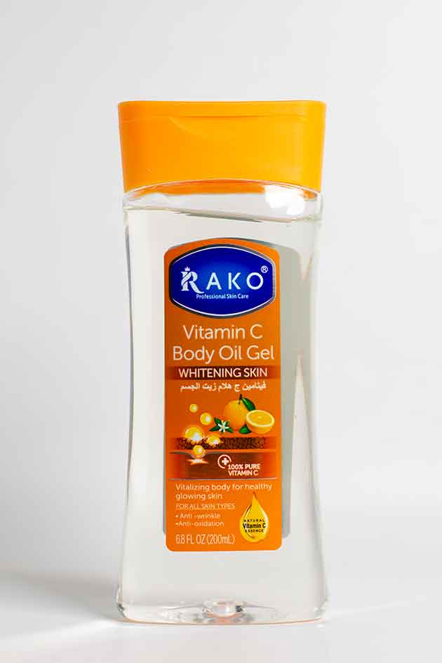 Rako Professional Jojoba Body Oil Gel – Deep Moisturizing Formula for Glowing Skin. Rako Vitamin C Body Oil Gel bottle on a white background