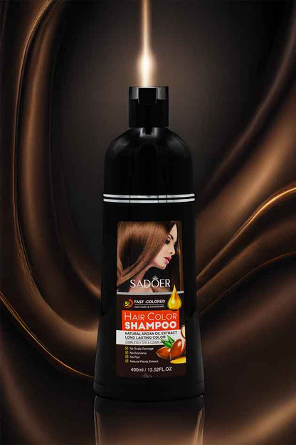 Sadoer hair color shampoo bottle with brown hair on label against a dark background
