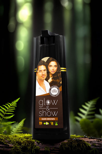 Glow and Show Dark Brown Hair Darkening Shampoo 180ml for men and women, Shampoo bottle with a label featuring a man and woman in a forest setting
