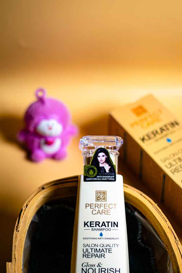 Lifestyle image of Yardlie Keratin Shampoo placed on bathroom counter for daily hair care. Keratin shampoo bottle with a blurred background