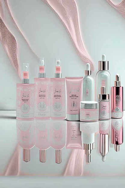 Disaar 6-in-1 skincare and body care combo set – fragrance shampoo, body wash, lotion, and repair facial products. Cosmetic products with pink and white packaging on a reflective surface
