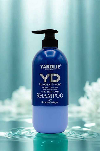Yardlie European Protein Capsule Shampoo on warm clinic beige background, showcasing gentle, daily use for reduced hair fall and breakage.. Yardlie shampoo bottle with a blue label on a water surface with blurred background
