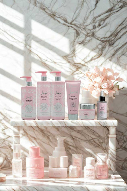 Disaar 6-in-1 skincare and body care combo set – fragrance shampoo, body wash, lotion, and repair facial products. Cosmetic products on a marble shelf with a floral arrangement