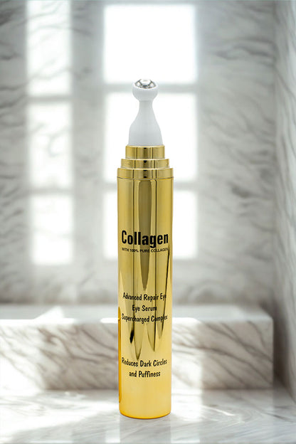 Collagen eye serum with roller on vanity, soft blur pampas background Gold collagen eye serum bottle on a marble surface with a blurred background