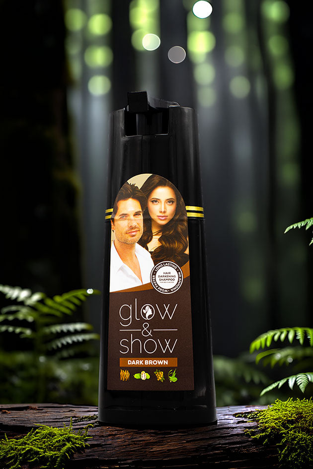 Glow and Show Dark Brown Hair Darkening Shampoo 180ml for men and women, Hair color product bottle with a man and woman's face on the label against a forest background
