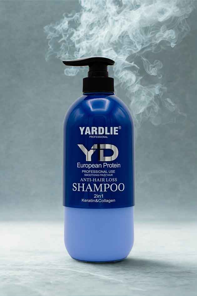Close-up of Yardlie European Protein Capsule Shampoo on aqua protein gradient, highlighting anti-hair-loss benefits and scalp strengthening. Yardlie shampoo bottle with smoke effect on a gray background