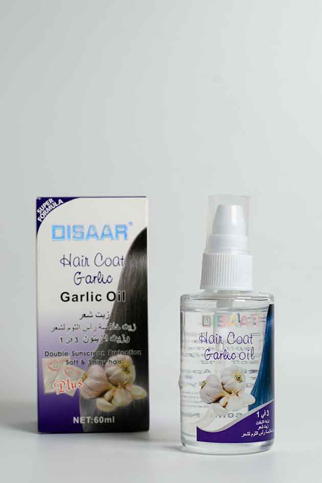 Disaar Hair Coat Garlic Oil – Anti-Hair Fall and Shine Serum (Stock Clearance Offer). Hair coat garlic oil bottle and packaging on a white background