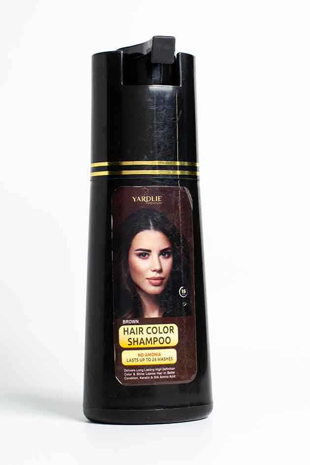 Yardlie Professional Brown Hair Color Shampoo – No Ammonia, 10% Leaked, Last 4 Pieces. Hair color shampoo bottle with a woman's face on the label against a white background
