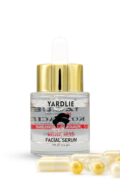 Yardlie Kojic Acid Avocado and Papaya Facial Serum 30ml pack front,
Yardlie Rotic Acid Facial Serum in a clear glass dropper bottle with a gold cap, shown on a white background with several gold capsules in the foreground.