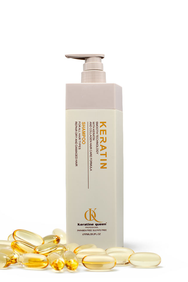 Keratine Queen Keratin and Collagen Smooth Shampoo 800ml for dry damaged hair and scalp care,
A tall rectangular pump bottle of Keratin hair repair formula standing upright on a white background, with scattered translucent golden hair capsules in the foreground.