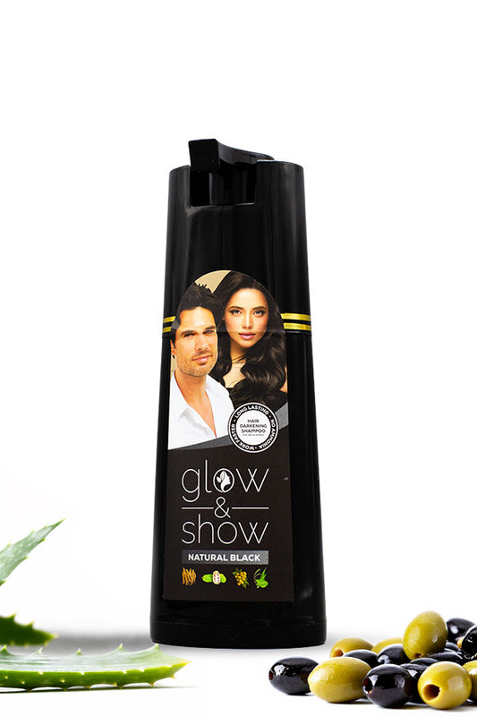Glow and Show Natural Black Hair Darkening Shampoo 180ml for men and women, Shampoo bottle with a label featuring a man and woman, surrounded by olives and green leaves on a white background.