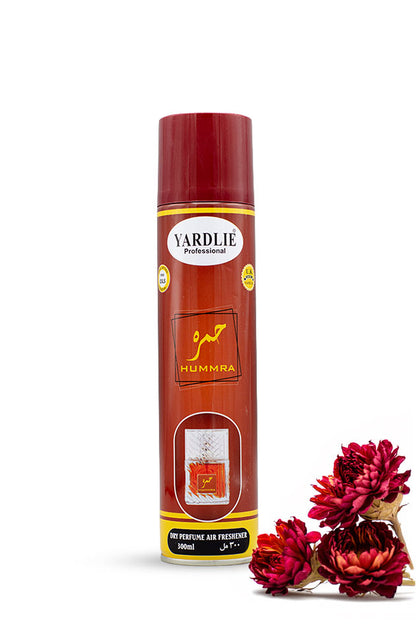 Yardlie Professional Hummra Dry Perfume Air Freshener 300ml maroon can,
A can of Yardlie Professional Humma air freshener with a red cap and red-brown label, shown on a white background with dried red flowers at the bottom right.