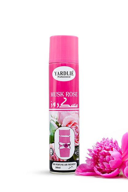 Yardlie Professional Yaari Dry Perfume Air Freshener 300ml pink can,
A can of Yardlie Professional Musk Rose perfume air freshener, featuring a bright pink cap and a pink label with rose graphics, shown next to a large pink peony flower on a white background.