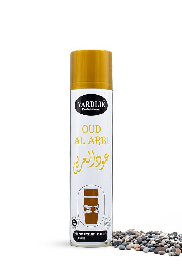 Yardlie Professional Oud Al Arbi Dry Perfume Air Freshener 300ml can,
A 500ml aerosol can of Yardli Professional Oud Al Arbi perfume air freshener, featuring a white body with a gold cap and gold lettering, displayed next to decorative pebbles on a white background.