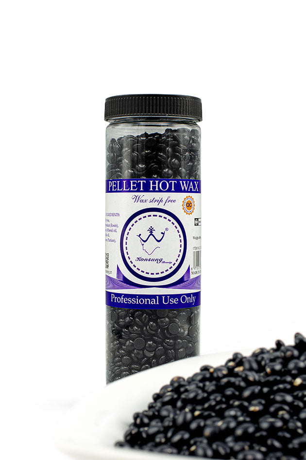 Konsung Beauty Pellet Hot Wax Beans 400g black hard wax for strip free hair removal,
A clear plastic jar filled with black wax melts, featuring a purple and white label with the brand name 'Merrygo.