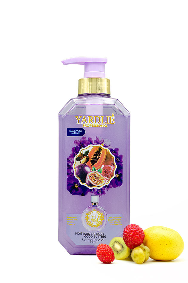 Yardlie Professional Violet and Fruit Moisturizing Body Wash 500ml purple pump bottle,
A bottle of Yardlie Professional Coco Butter moisturizing body lotion in purple, featuring a gold pump and a fruit illustration on the label. Fresh fruits including a mango, kiwi, and berries are arranged at the base on a white background.