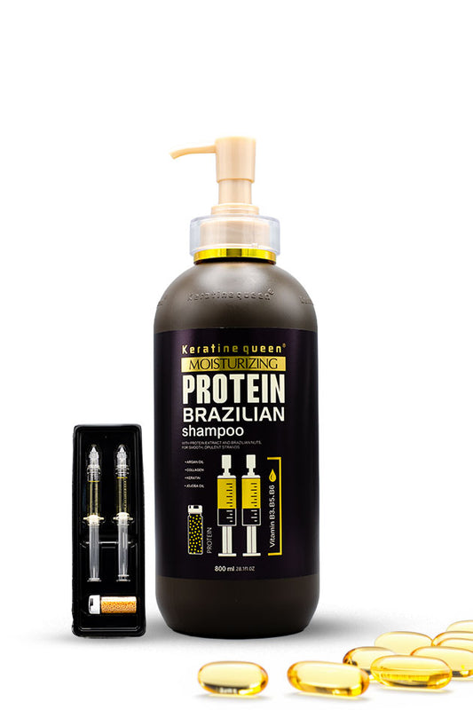 Keratine Queen Brazilian Protein Shampoo Set with 800ml shampoo, 2 ampoules and golden serum.
A bottle of Keratine Queen Protein Brazilian Shampoo with a pump dispenser, shown alongside a small black box containing two syringe-style applicators and several gold-colored capsules on a white background.