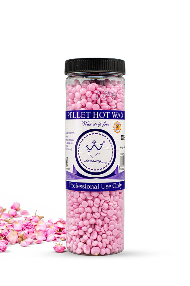 Konsung Beauty Pink Pellet Hot Wax Beans 400g pink hard wax for strip free hair removal,
A clear plastic jar filled with pink wax melt pellets, featuring a black lid and a white and purple label with the brand name 'Monstery'. Pink rose petals are scattered on the left side of the white background.