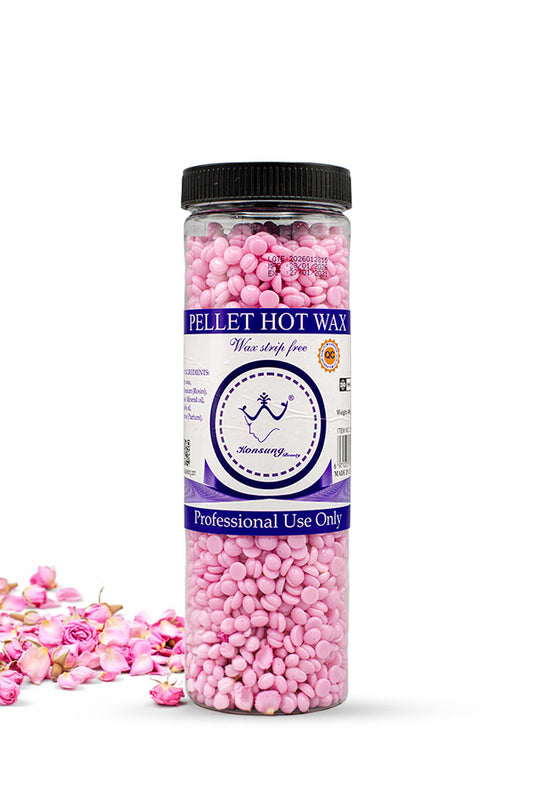 Konsung Beauty Pink Pellet Hot Wax Beans 400g pink hard wax for strip free hair removal,
A clear plastic jar filled with pink wax melt pellets, featuring a black lid and a white and purple label with the brand name 'Monstery'. Pink rose petals are scattered on the left side of the white background.