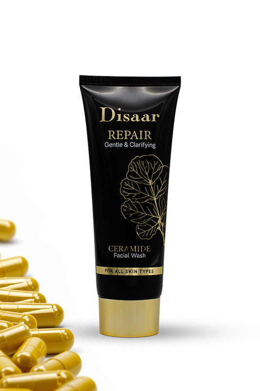 Disaar Repair Ceramide Facial Wash 120g moisturizing and soothing cleanser for all skin types, Tube of Disaar Repair facial wash with gold capsules on a white background