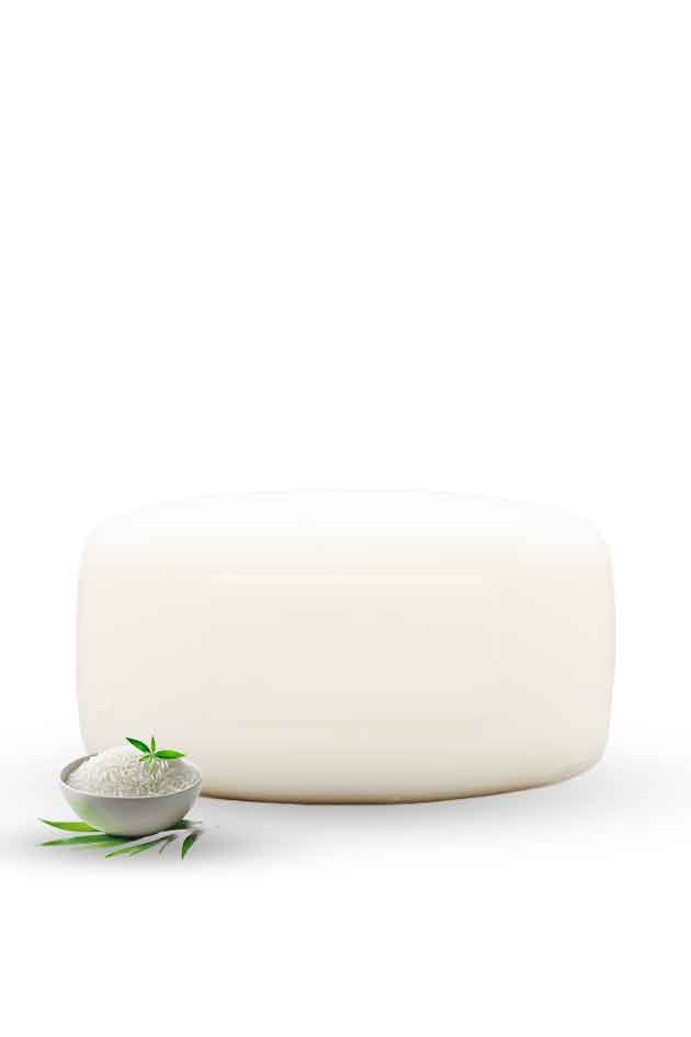 Yardlie Super Whitening Essential Soap box with white soap bar on clean background, White stone with a small bowl of salt and green leaves on a white background