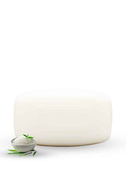 Yardlie Super Whitening Essential Soap box with white soap bar on clean background, White stone with a small bowl of salt and green leaves on a white background