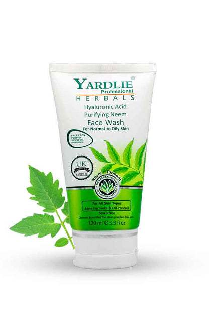 Tube of Yardlie Herbals Face Wash with green leaves on a white background