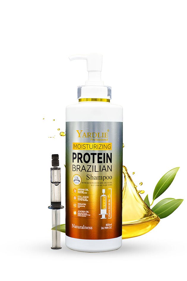 Yardlie Moisturizing Protein Brazilian Shampoo bottle with leaves and oil droplets on a white background. With Free Injection